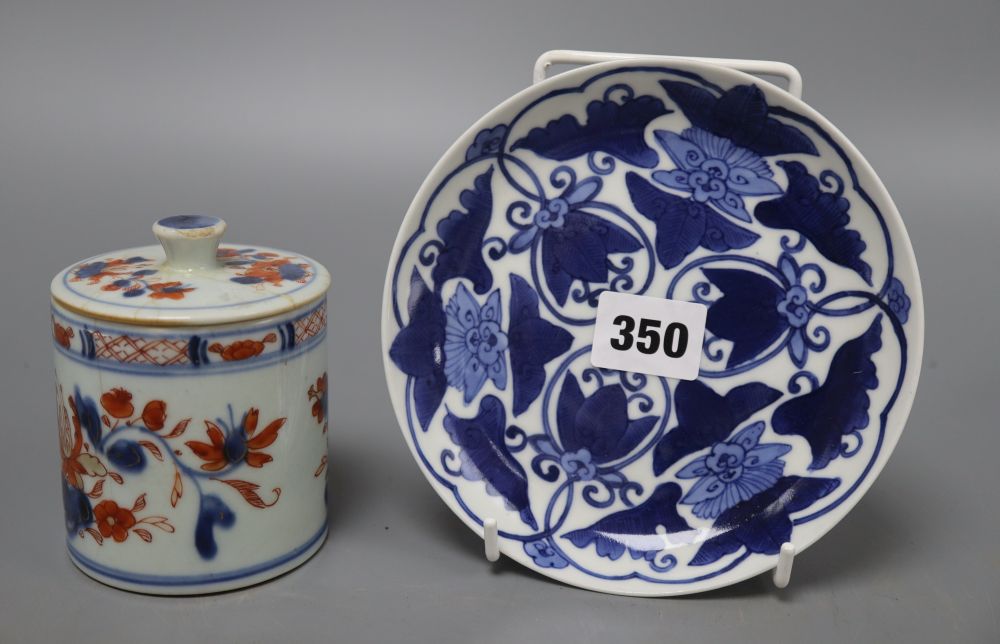 A Japanese blue and white dish, diameter 15cm, and a Chinese Imari jar box and cover